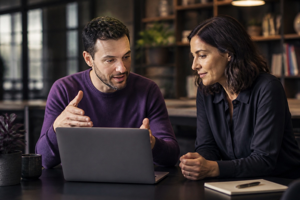IT adviser clearly explaining technology to a business owner